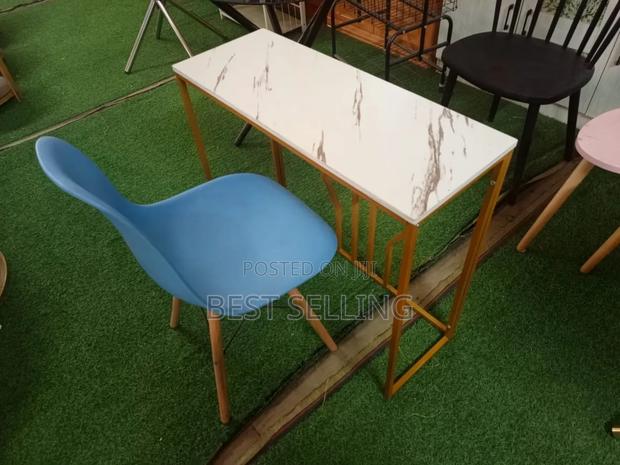 Coffee Table and Eams Chair