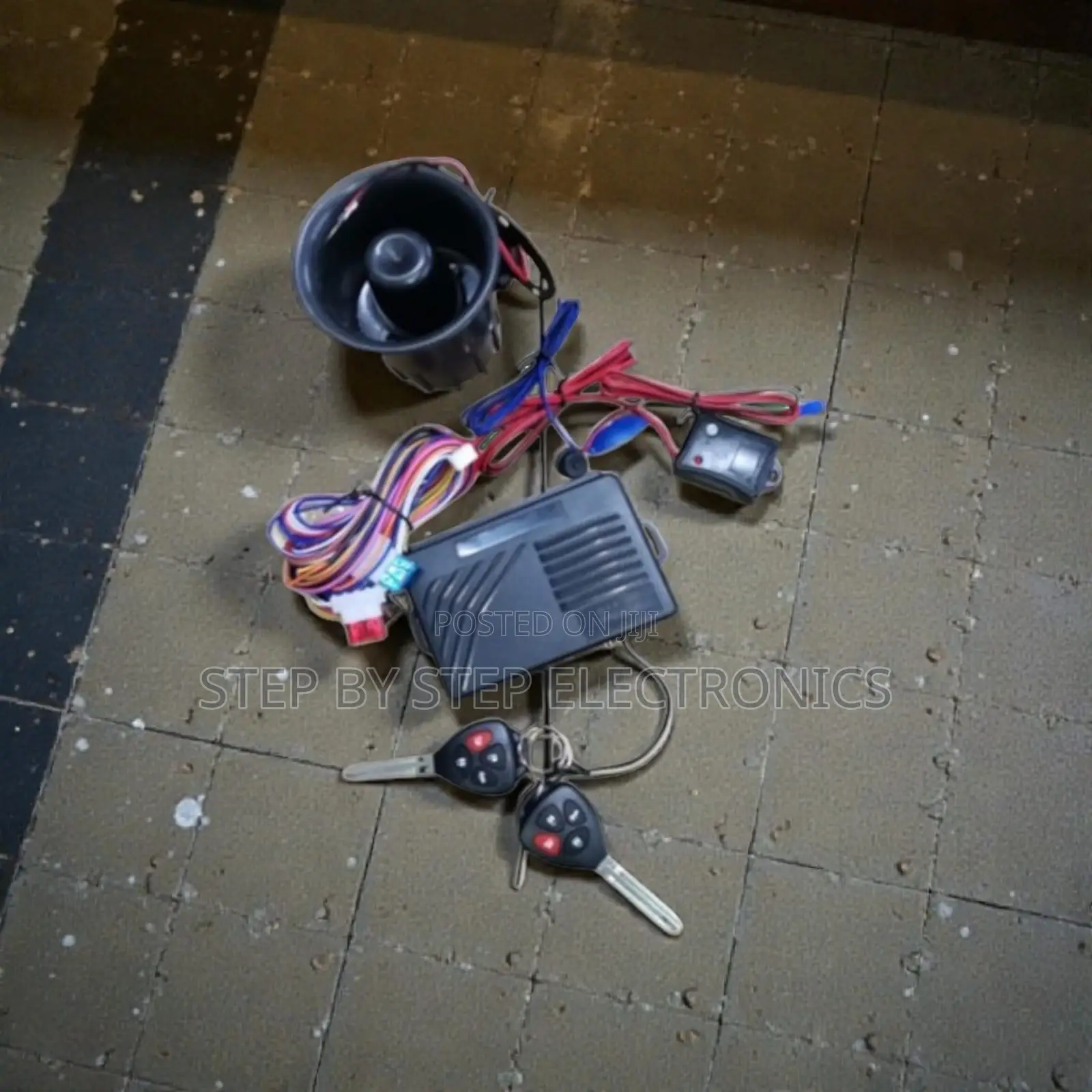 Anti-Theft Car Alarm With Flip Keys, Door Trigger and Shock Alert