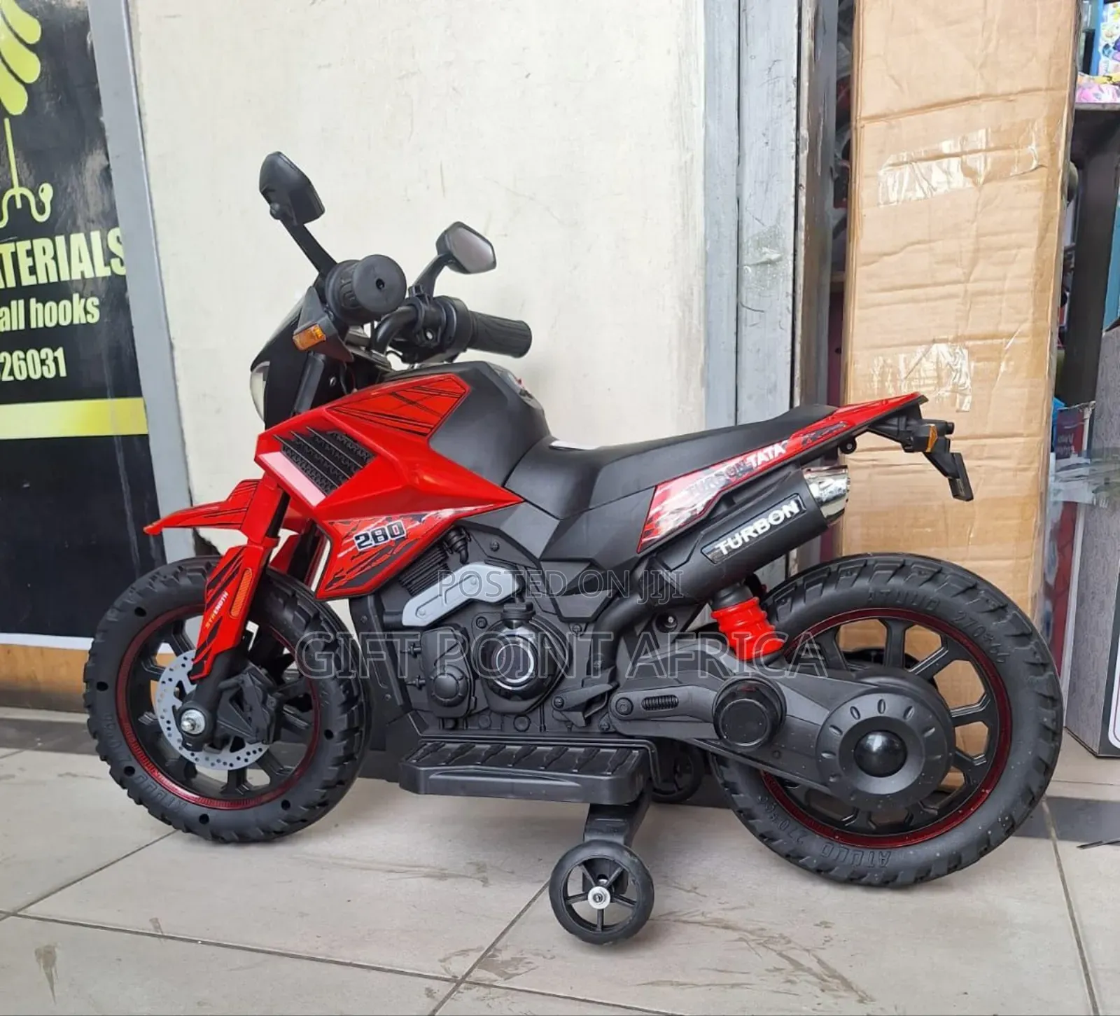 Remote  Controlled Electric Motorcycle For Kids In Red Color Way