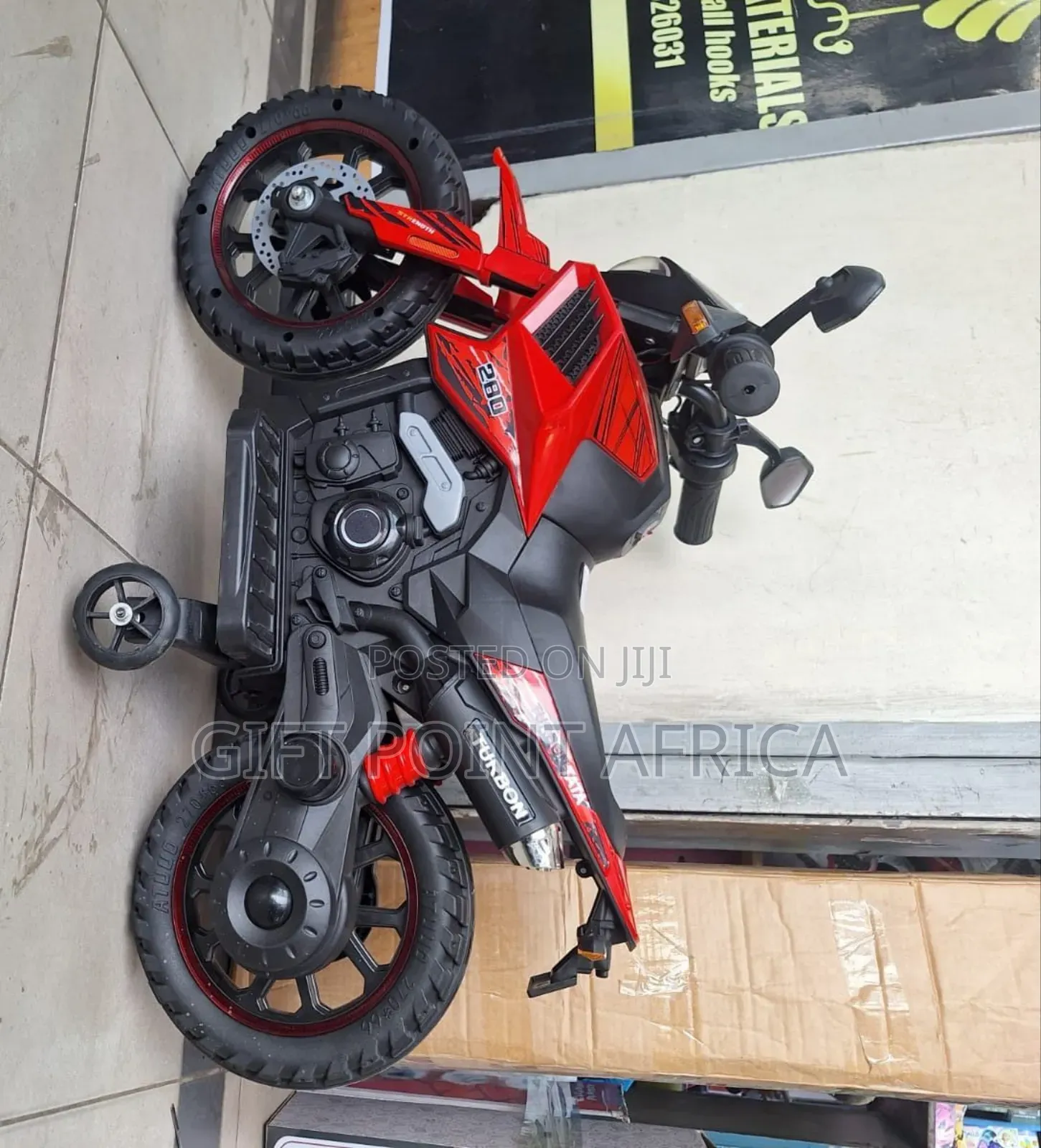 Remote  Controlled Electric Motorcycle For Kids In Red Color Way