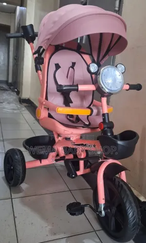 Baby Tricycle With Swivel Seat/Lights/Retractable Footrest