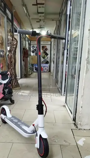 White Waflex Electric Scooter.