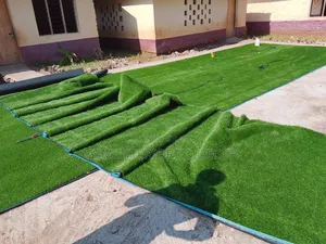 Artificial Green Grass Carpets in Curvy Folds
