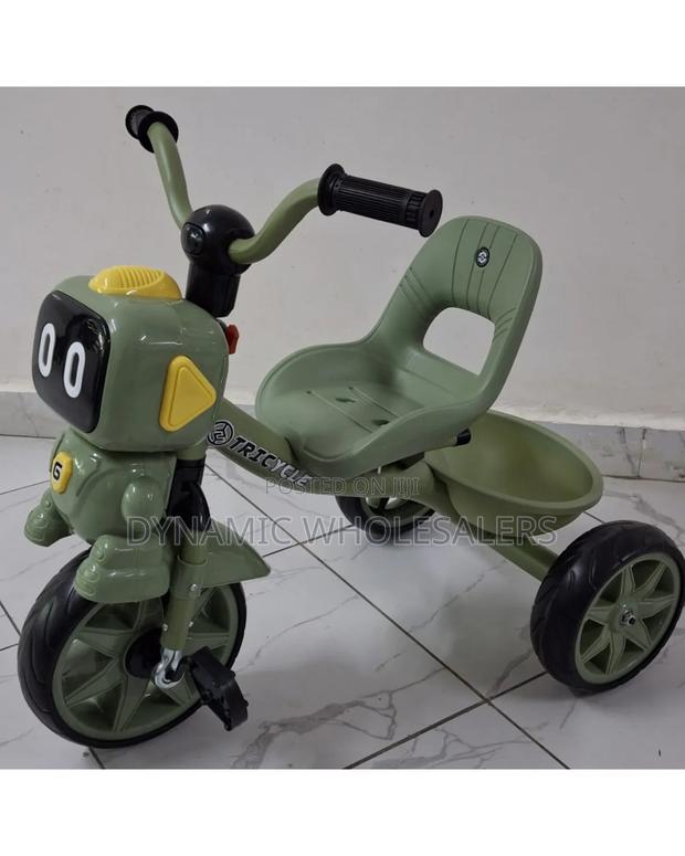 Green Children's Tricycle With a Robot Design