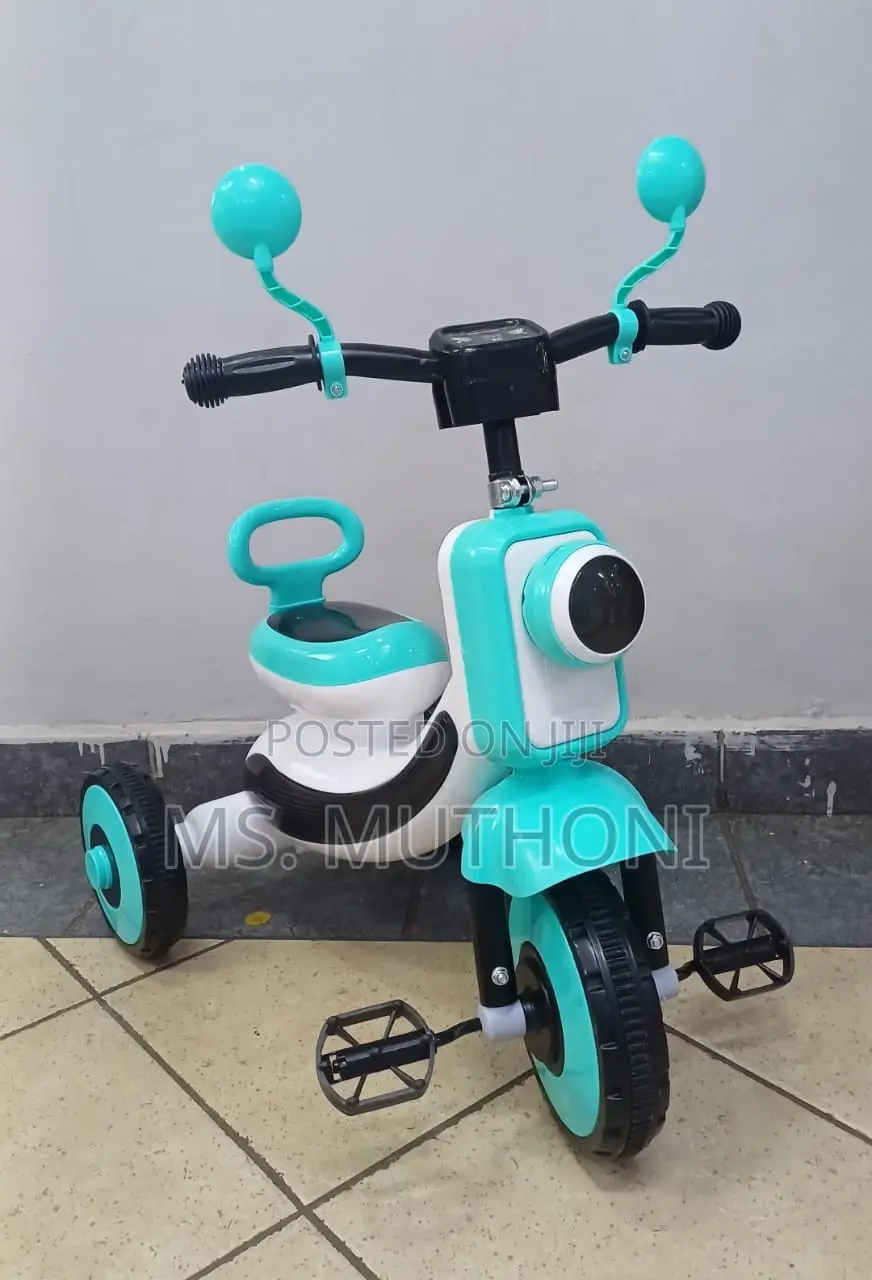 Children's Tricycle With a Motorbike Design With Music Light