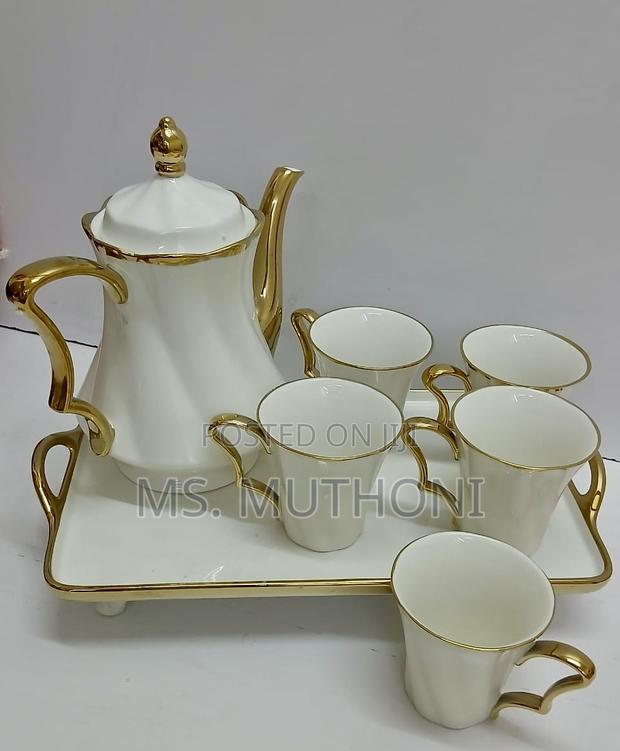 8 Piece White Ceramic Tea Set With Golden Rim - main view