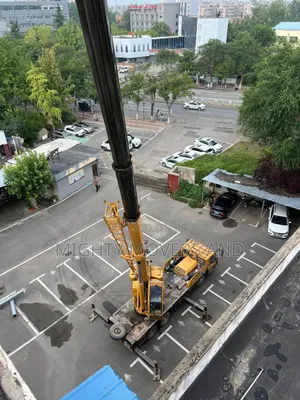 Trailers With Cranes Are Available for Hoisting and Logistics