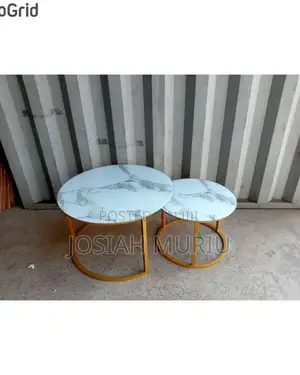 Elegant Marble Nesting Coffee Tables With a Glass-Effect Finish