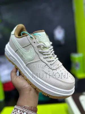 Nike Air Force 1 Luxe Sneakers in a Beige and Mint Green Colorway
