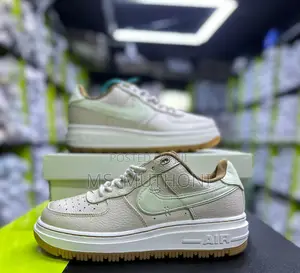 Nike Air Force 1 Luxe Sneakers in a Beige and Mint Green Colorway