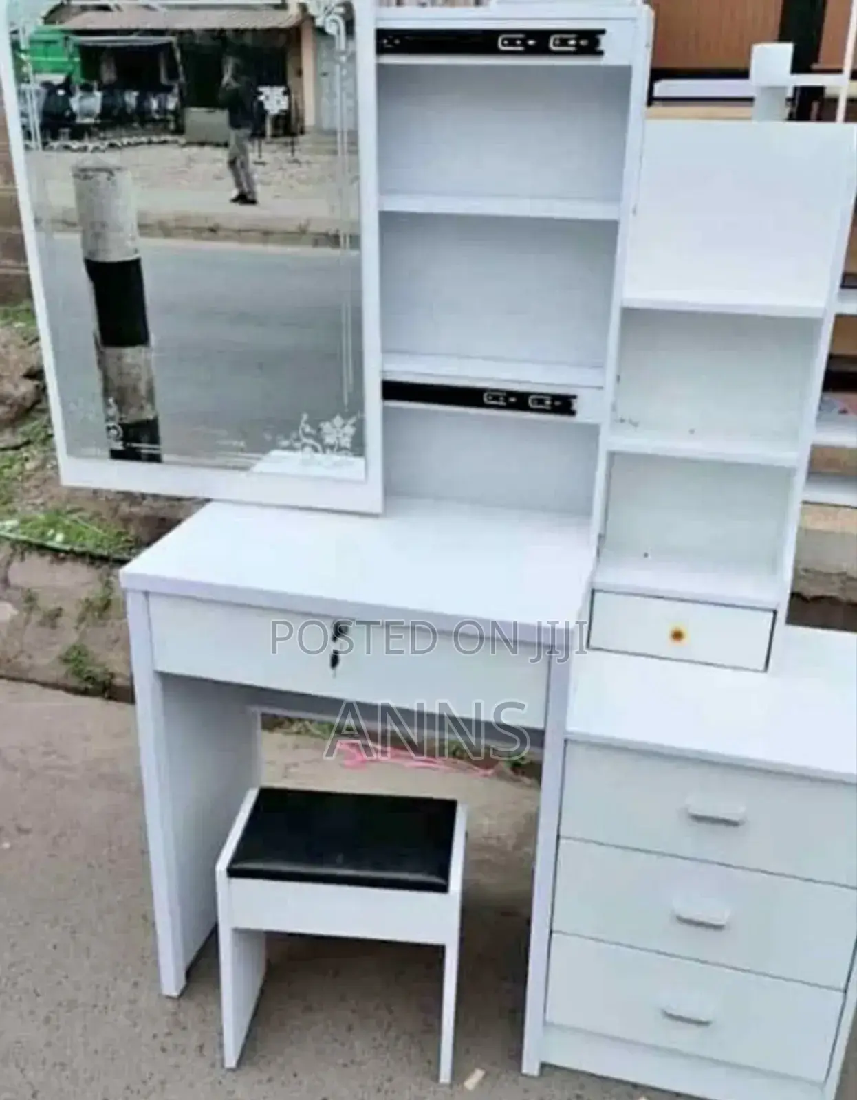 White Dressing Table With a Wide Sliding Mirror