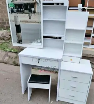 Portable White Dressing Table With a Wide Sliding Mirror
