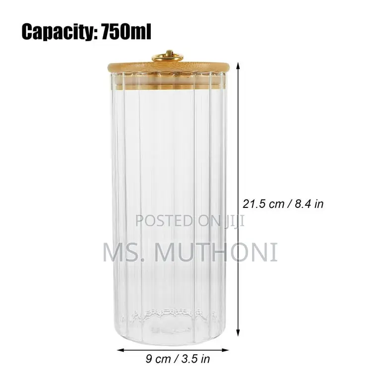 A Set of 3 Glass Food Store Jars With Bamboo Lids.