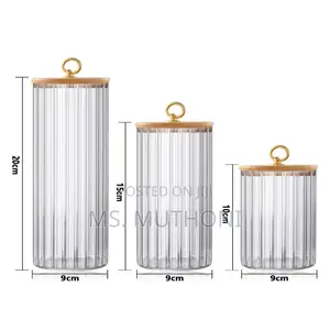 A Set of 3 Glass Food Store Jars With Bamboo Lids.