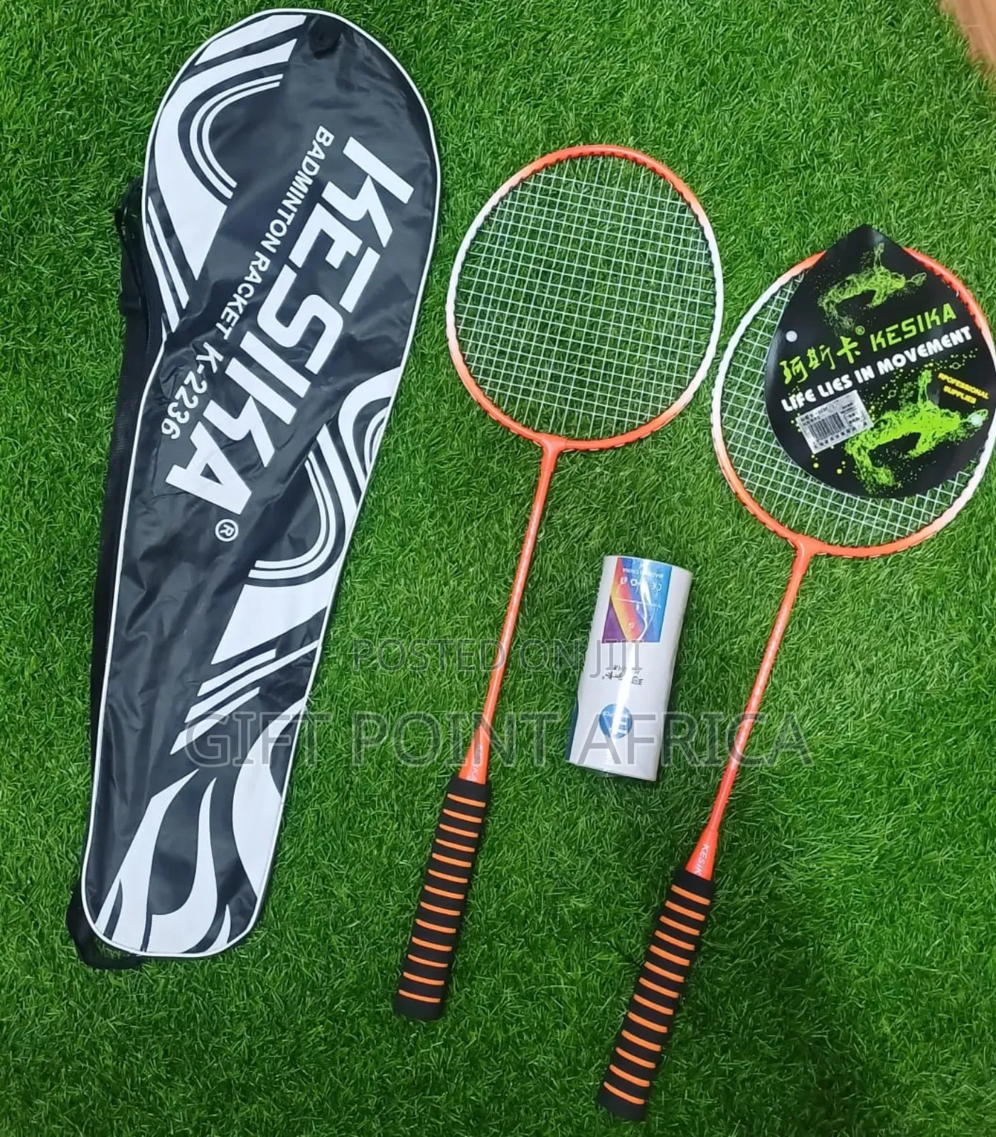 A Pair Of Badminton Rackets With Shuttles And Carrier Bag