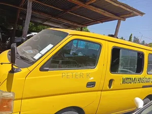 Nissan Caravan (Urvan) 2009 Yellow