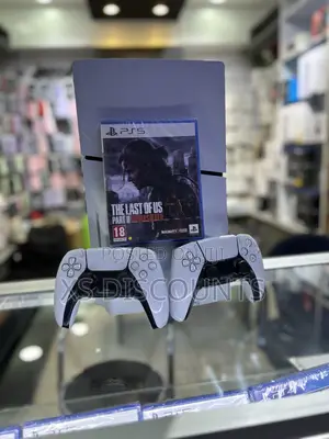 Used Playstation 5 Slim and 2 Controllers With the Last of Us 2 Bundle