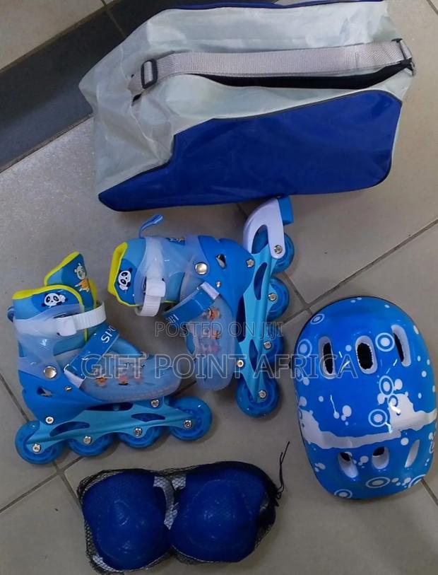 7 In Adjustable Roller Skates With Guards Helmets And A Carrier Bag