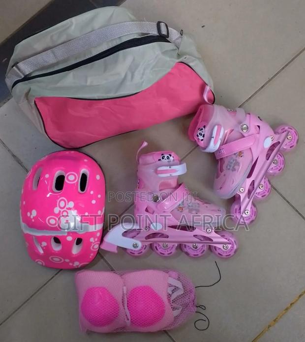 7 In Adjustable Roller Skates With Guards Helmets And A Carrier Bag - thumbnail 2