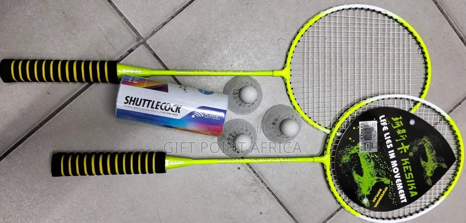 A Pair Of Badminton Rackets With Three Shuttles Cocks And Carrier Bag