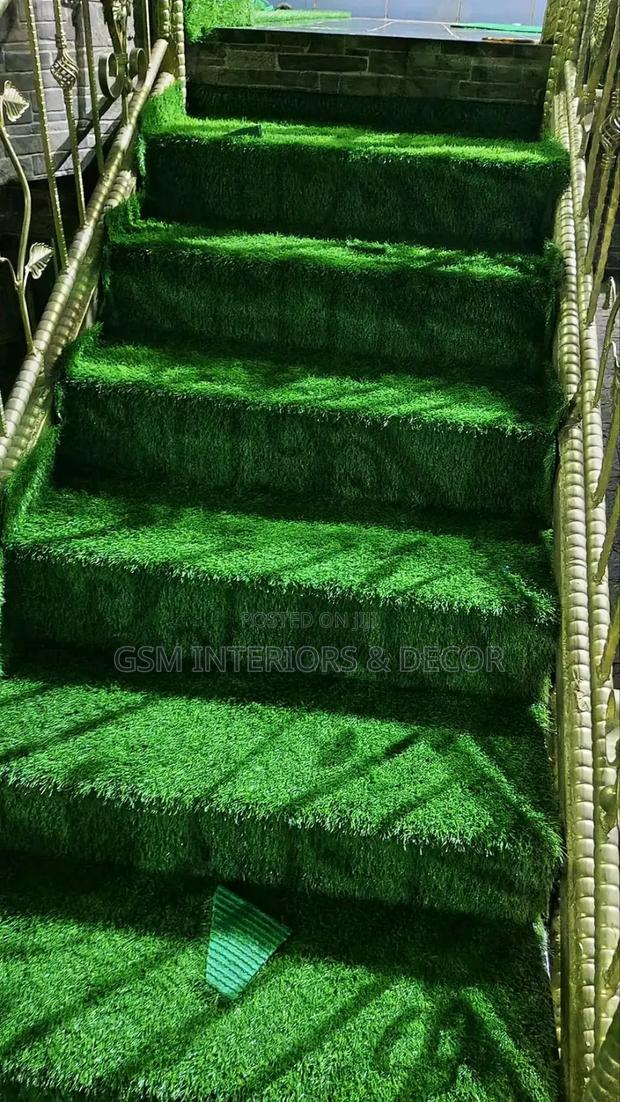 Artificial Green Grass Carpets in Shaded Stairs