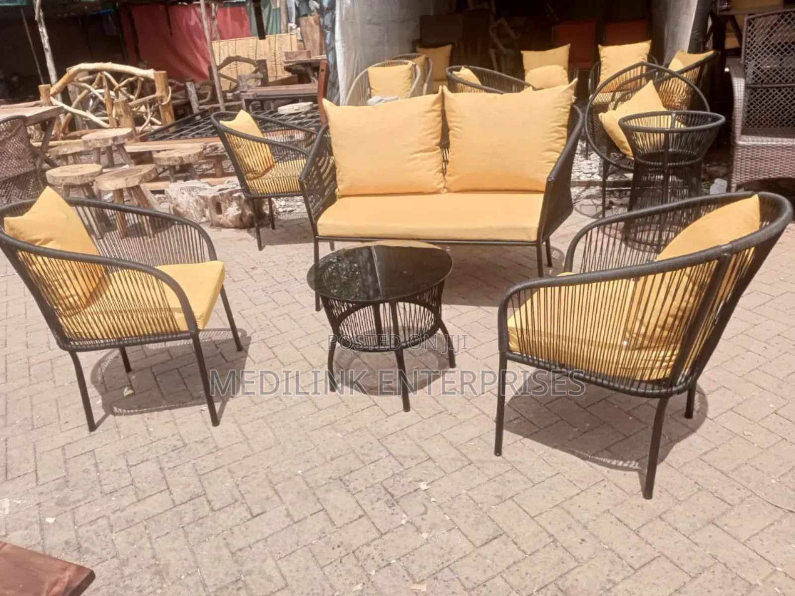 Metallic Handwoven Cushioned Outdoor 4-Seater Set and a Table