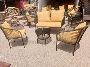 Metallic Handwoven Cushioned Outdoor 4-Seater Set and a Table