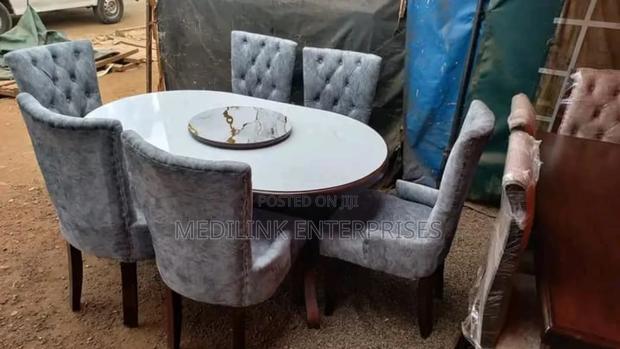Upholstered Marble 6-Seater Dinning Table Set With a Revolver