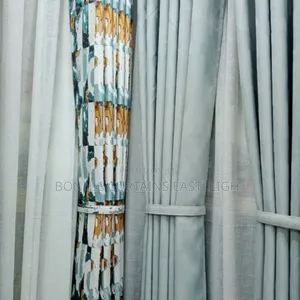 Orange Mixed With White Curtains and Sheers