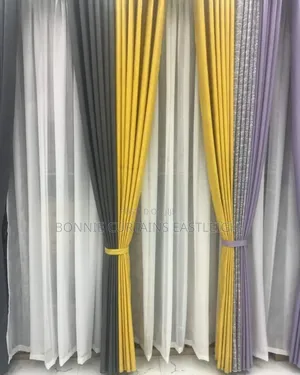 Grey Mixed With Orange Curtains and Sheers