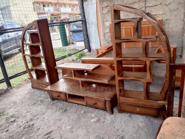 Half Moon Tv Stand Made of Mahogany Wood