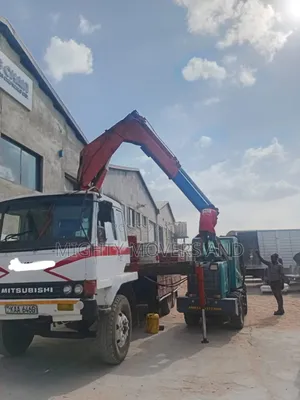 Transit Trucks With Lifting Cranes Are Readily Available for Jobs