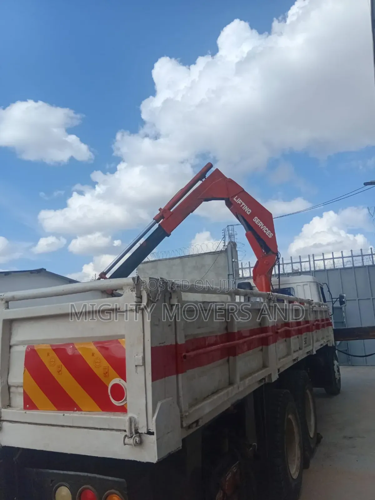 Lifting Cranes With Lorries Are Ready for Jobs and Errands