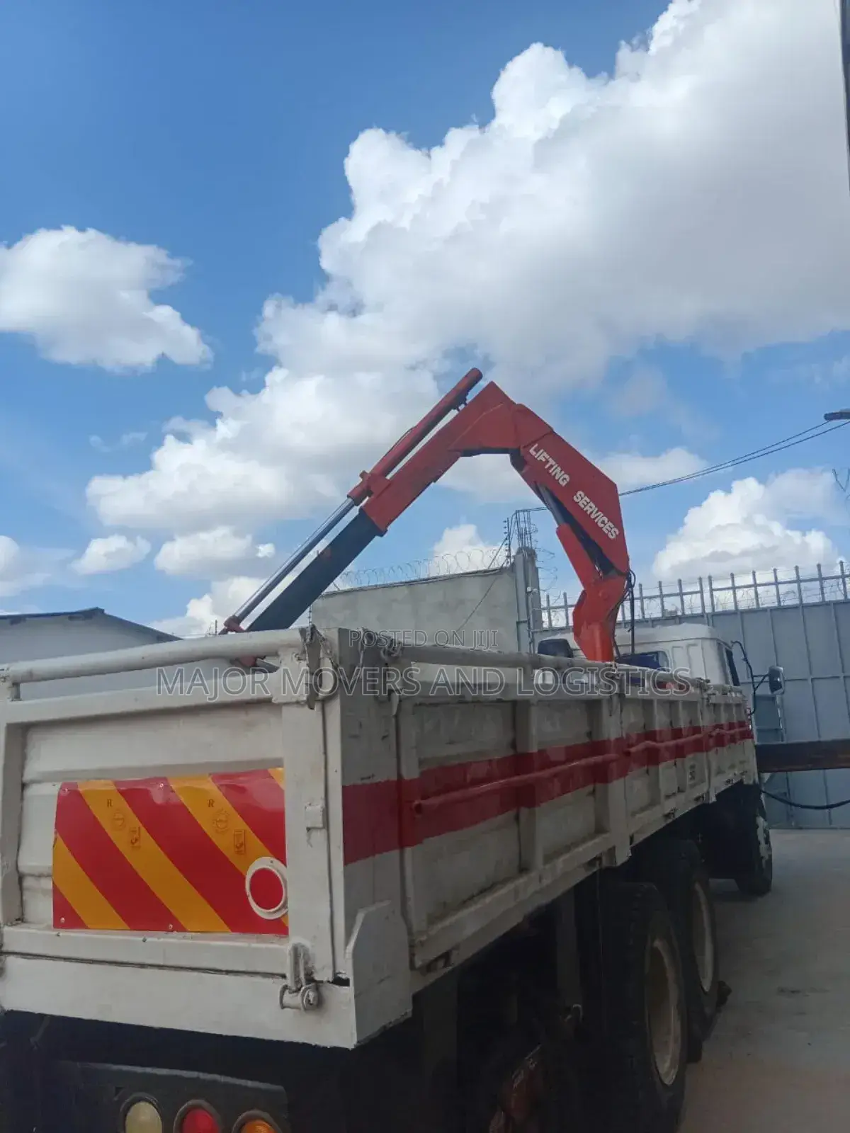 Lifting Cranes With Lorries Are Ready for Jobs and Errands