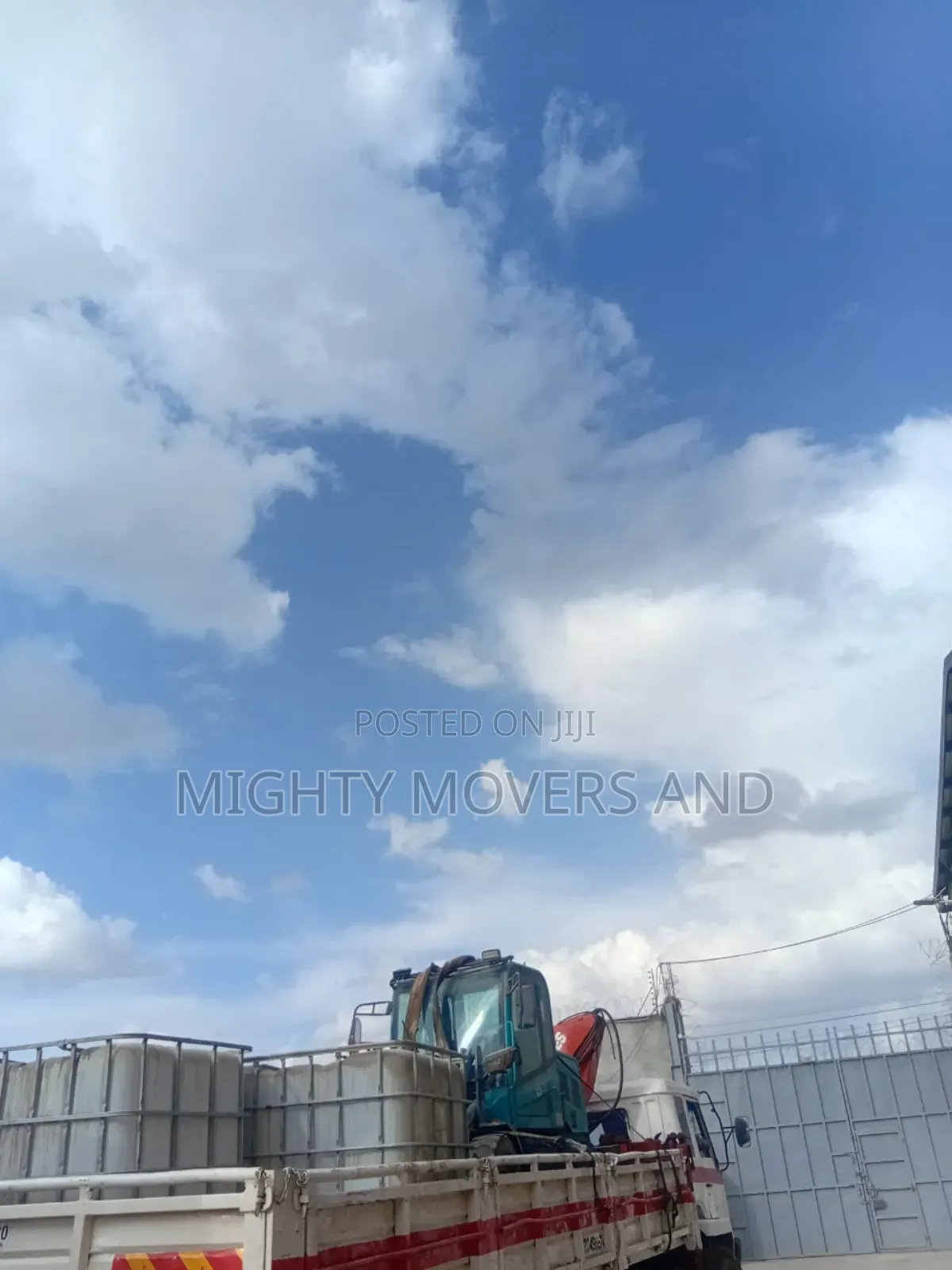 Lifting Cranes With Lorries Are Ready for Jobs and Errands