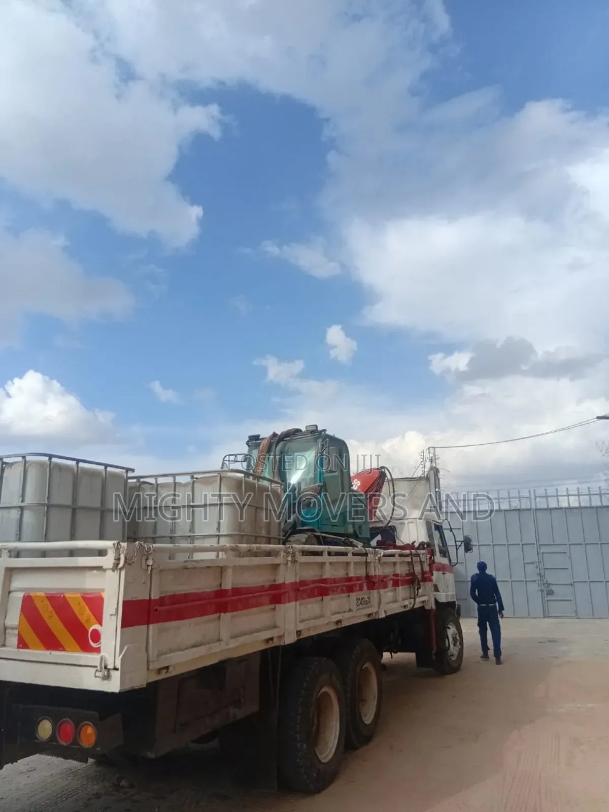 Lifting Cranes With Lorries Are Ready for Jobs and Errands