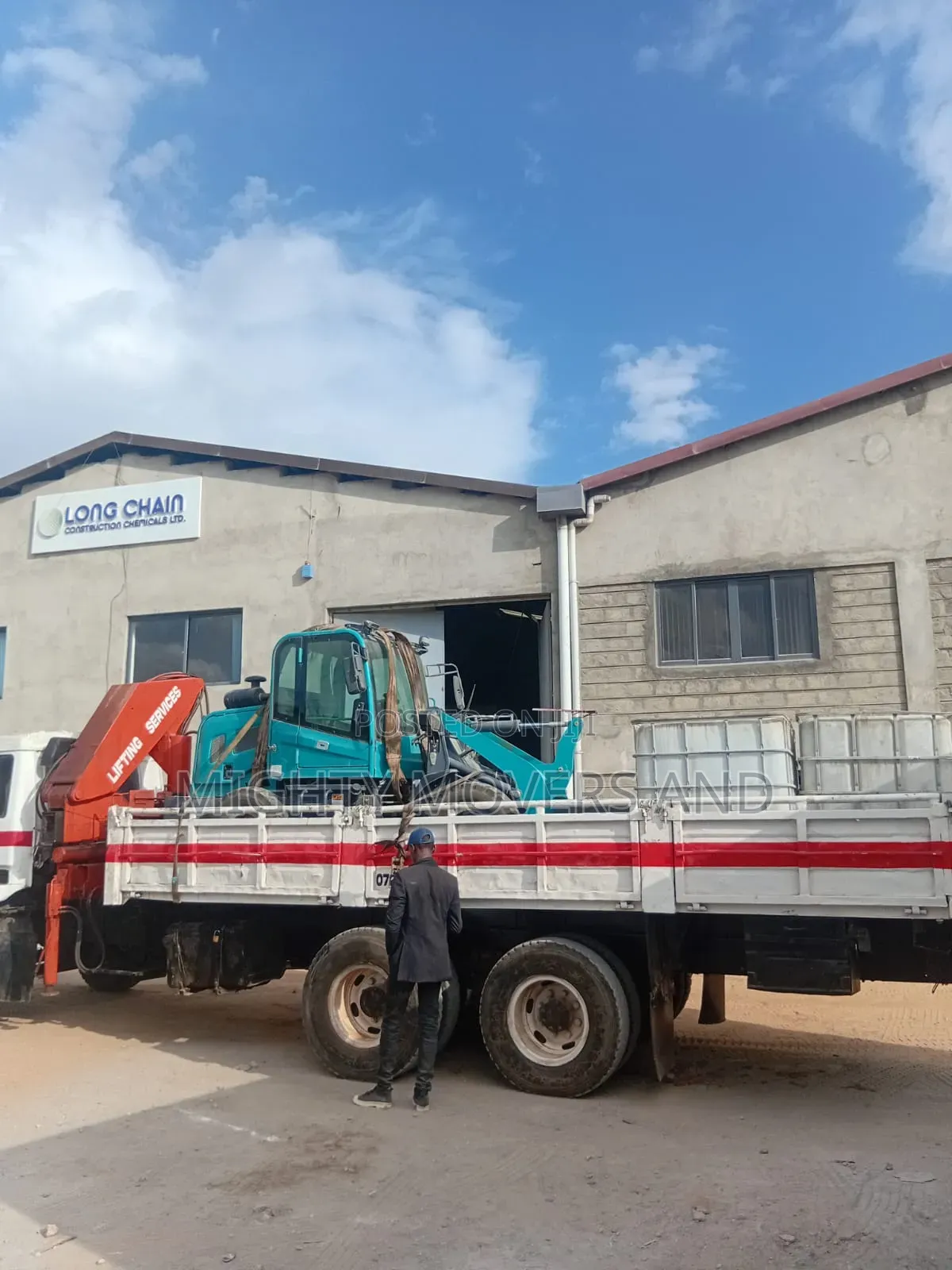 Lifting Cranes With Lorries Are Ready for Jobs and Errands
