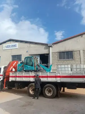 Lifting Cranes With Lorries Are Ready for Jobs and Errands