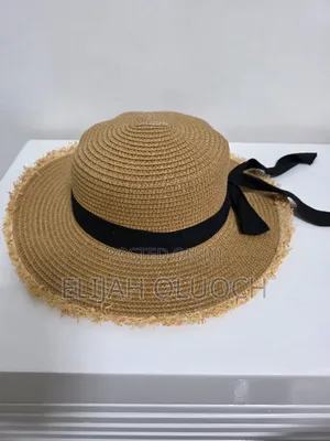 Elegahnt Widle Brim Straw Beach/Sun Hat With Black Ribbon