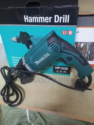710w Makita Hammer Drill Hp1630 /Drills