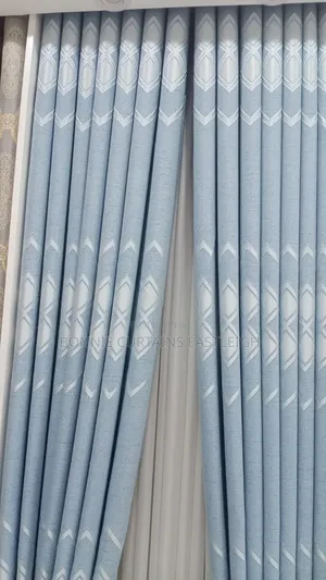 Sky Blue Curtains Mixed With Gold for Living Rooms