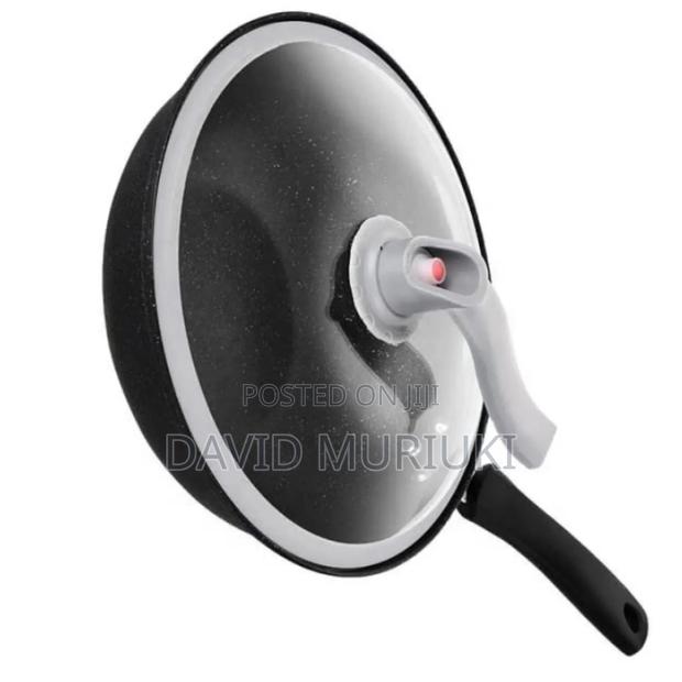 Wok Pan 
32 Cm Diameter 
Non Stick 
Glass Lid 
Pressure Release