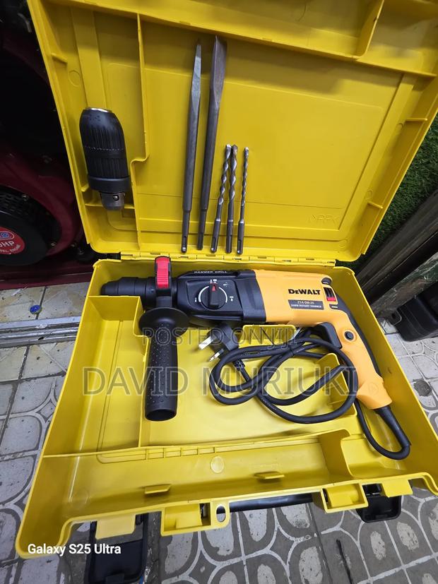 Dewalt Rotary Hammer With Two Chunks - main view