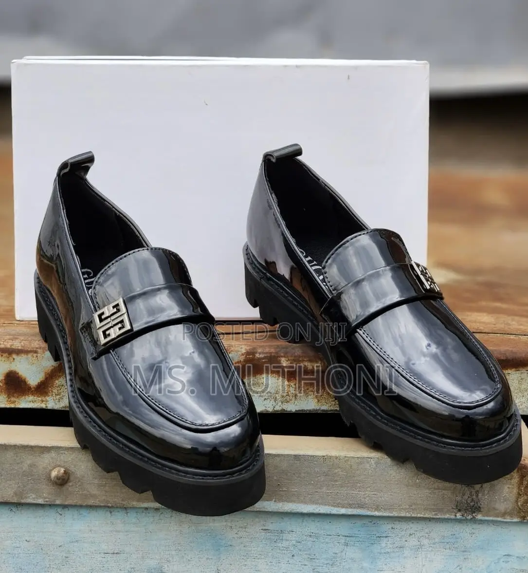 Black Patent Leather Chunky Loafers With a Metal Chain Accent