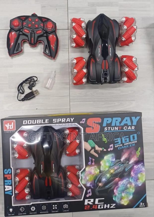 Remote Controlled Rechargeable Light Double Spray Stunt Car For Boys - main view