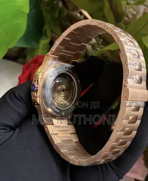 Patek Philippe Nautilus 5711/1r-001 Watch Rose Gold a Brown Dial.