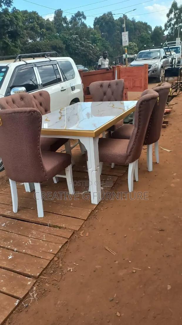 A 6 Seater Marble Dinning Set
