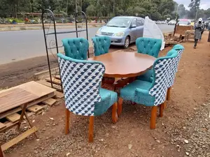 A 6 Seater Oval Dining Set