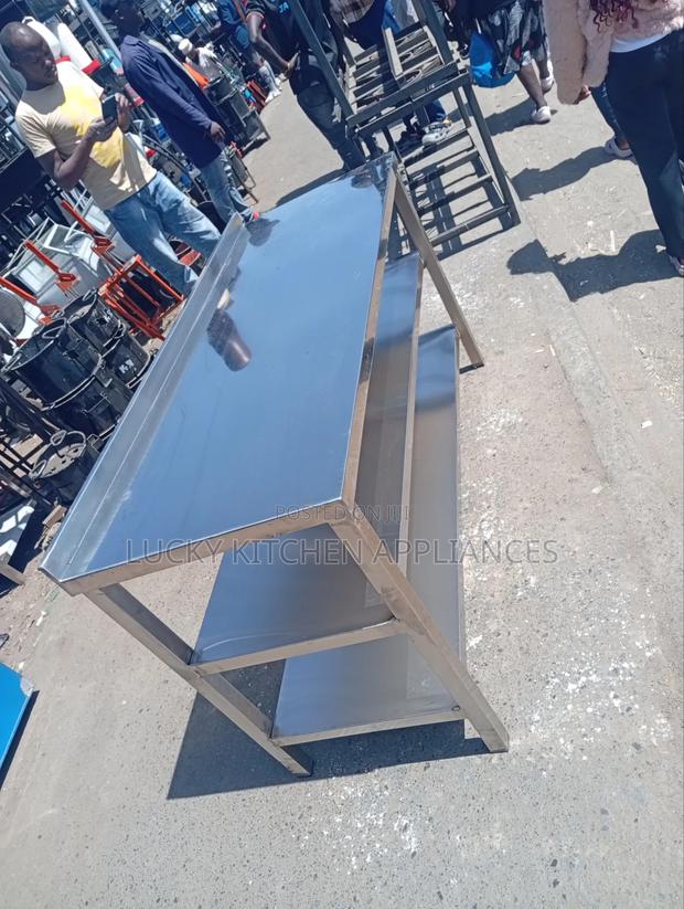 Stainless Steel Walking Top With Under Shelves.