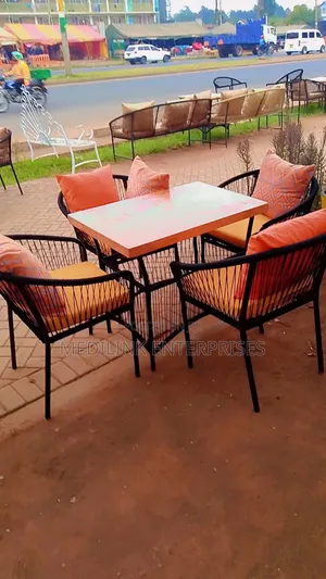 Handwoven Cushions Metallic Outdoor Set With a Table
